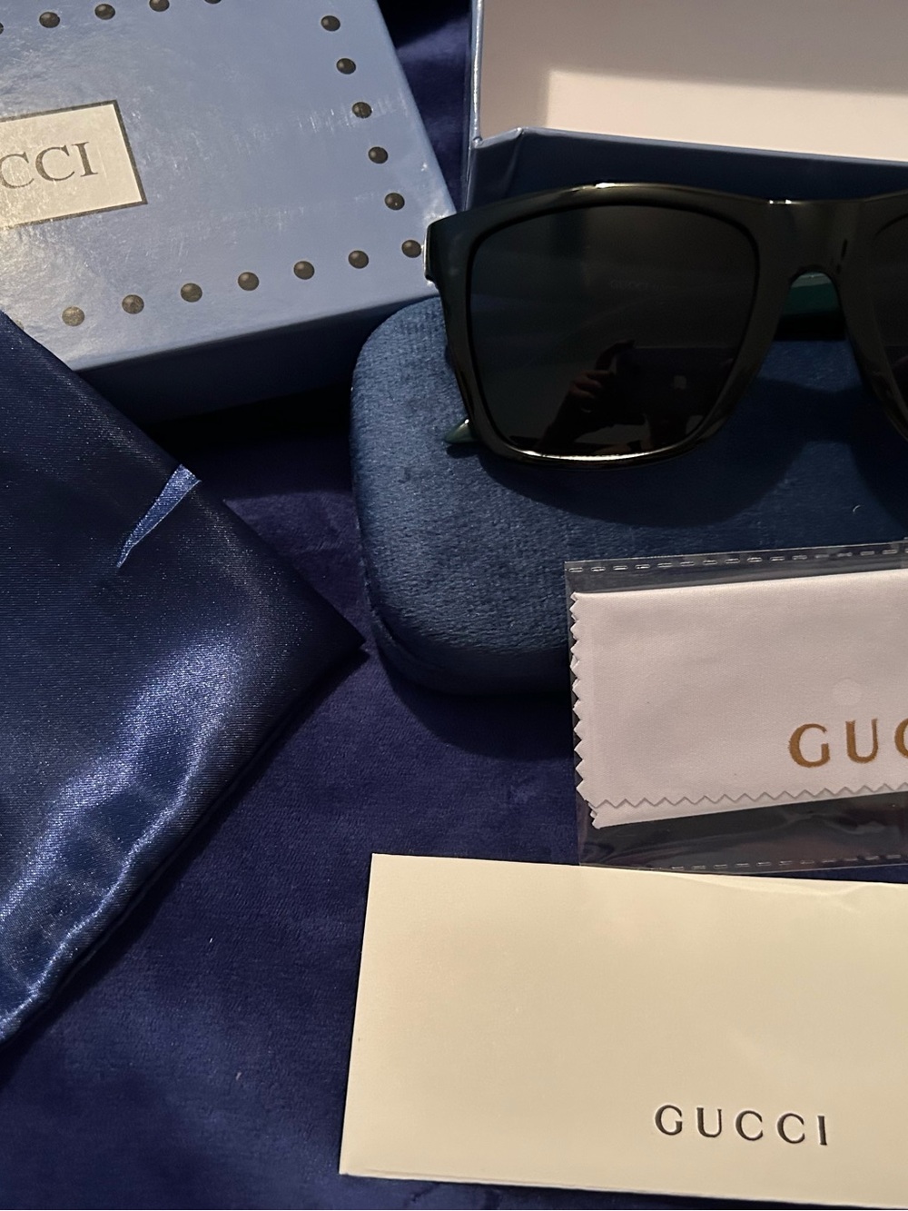 Gucci Black Rectangular Womens Sunglasses with Dark Lenses and striped sides